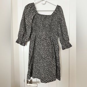 Madewell black and white floral smocked mini dress.